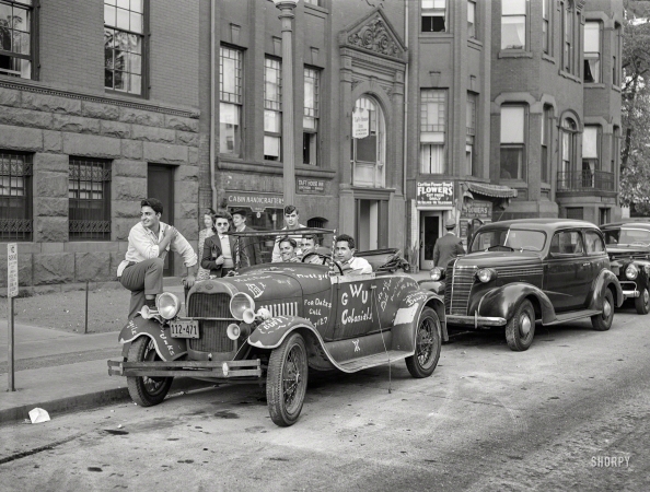 Photo showing: Meet Muttzie -- May 1942. Washington, D.C. Student's car in front of University Club on K Street N.W.