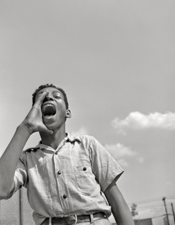 Photo showing: The Annunciation -- June 1942. Anacostia, D.C. -- Frederick Douglass housing project. Boy at the playground.
