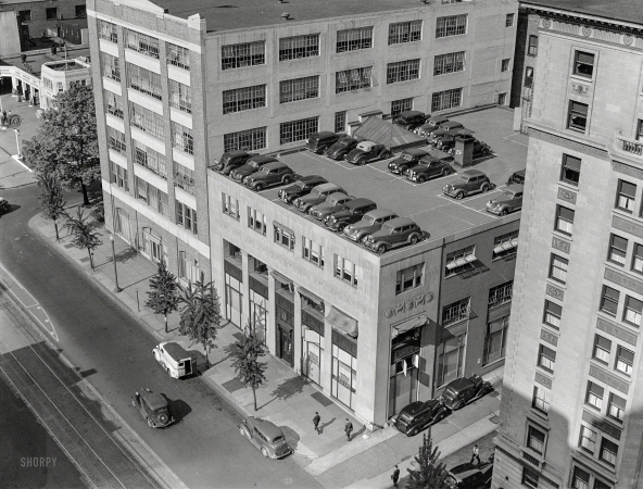 Photo showing: Poised to Pounce -- July 1939. Rooftop parking, Washington, D.C.