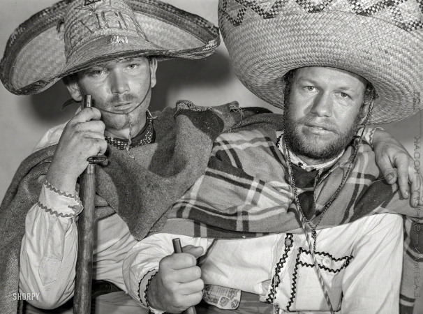 Photo showing: Faux Bandidos -- February 1942. Brownsville, Texas. Charro Days fiesta. A pair of bandidos.