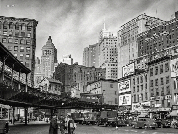 Photo showing: Manhattan Melodrama -- December 1941. Elevated train structure and buildings -- Lower Manhattan.