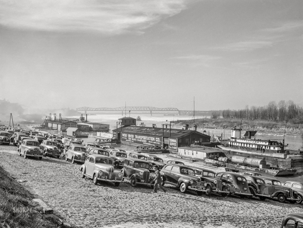 Photo showing: Warner and Tamble -- January 1942. Memphis, Tennessee. Cars parked on Mississippi River levee.