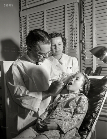 Photo showing: Like Pulling Teeth -- February 1942. Dental clinic, Farm Security Administration camp, Weslaco, Texas.