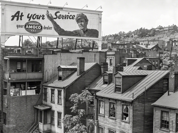 Photo showing: At Your Service -- July 1938. Houses along Monongahela River and Boulevard of the Allies. Pittsburgh, Pennsylvania.