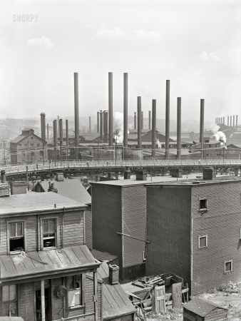 Photo showing: Home, Work -- July 1938. Slums near steel mill. Pittsburgh, Pennsylvania.