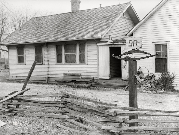 Photo showing: Dr. Springs -- January 1939. Dr. Springs' office. Colp, Illinois.