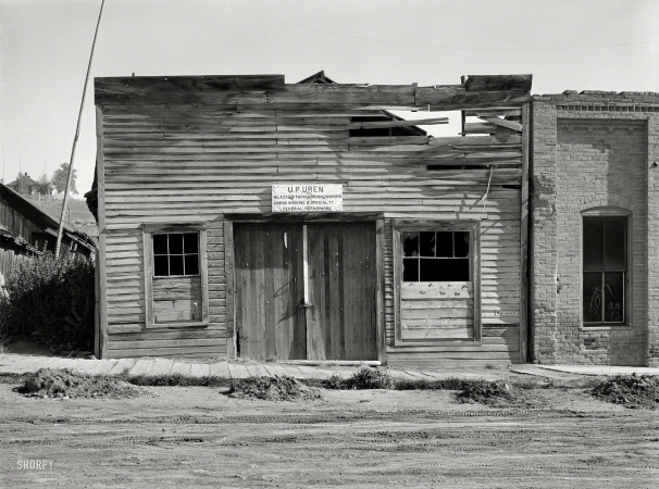 Photo showing: The Old Hard Shoe -- June 1939. Ruins of blacksmith shop. Virginia City, Madison County, Montana.