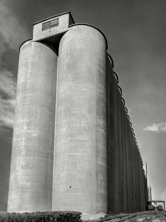 Photo showing: Tall Grain -- May 1939; Grain elevators. Great Falls, Cascade County, Montana.
