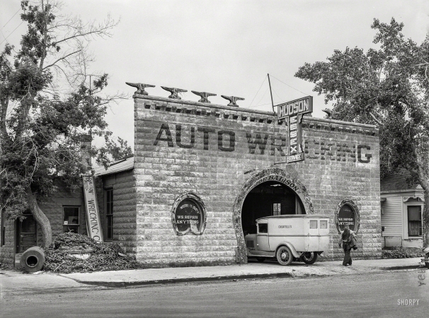 Photo showing: Wrecking by Joe -- June 1939. Blacksmith shop now used for auto repair. Glendive, Montana.