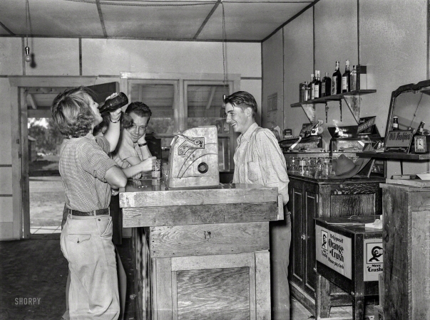 Photo showing: Bar Belle -- June 1939. Dudes at bar. Birney, Montana.