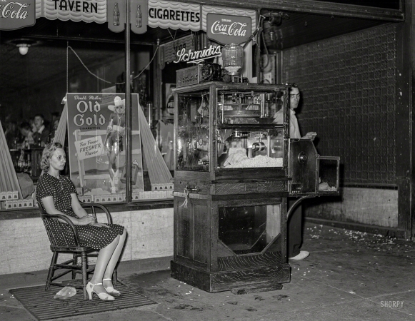 Photo showing: Name Your Poison -- September 1939. Popcorn stand. Iowa Falls, Iowa.