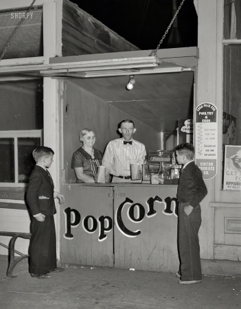 Photo showing: Mom-and-Pop. -- September 1939. Popcorn stand. Grundy Center, Iowa.