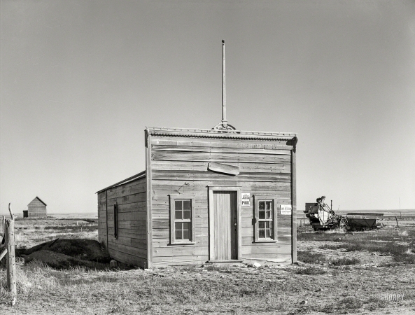 Photo showing: Tiny Courthouse -- November 1937. Old justice court and U.S. Commissioners court in Dagmar. Sheridan County, Montana.