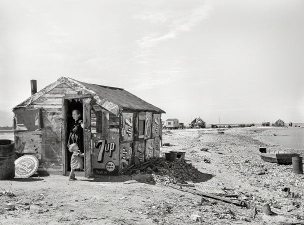 Photo showing: Casa Siete -- February 1939. Shack of war veteran with view along Nueces Bay. Corpus Christi, Texas.