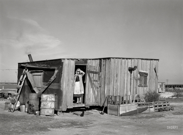 Photo showing: Self-Contained -- March 1939. Home of fisherman squatter on shores of Nueces Bay. Corpus Christi, Texas.