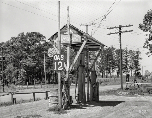 Photo showing: Less Filling -- April 1939. Service station. San Augustine, Texas.