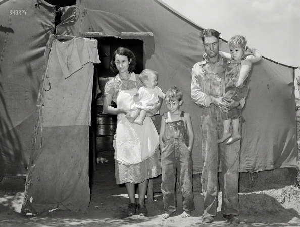 Photo showing: Rabies Babies -- June 1939. Day laborer and his family who live in the Arkansas River bottoms near Webbers Falls,
Oklahoma. This entire family was taking anti-rabic serum after drinking milk from a cow which had rabies.