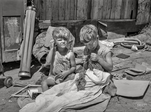 Photo showing: Daddy Is a Trasher -- July 1939. Children of May Avenue camp, Oklahoma City. Their father is a trasher.