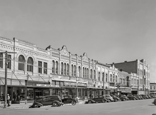 Photo showing: Gonzales, Texas -- November 1939. Scene in the business section.