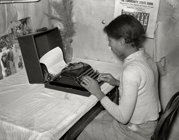 Photo showing: Dear Sis -- -- February 1940. Creek County, Oklahoma. Wife of tenant farmer Pomp Hall, writing on typewriter.