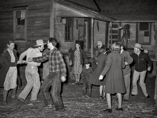 Photo showing: Swing Your Pardner -- February 1940. Swing game at 'play party' in McIntosh County, Oklahoma.
