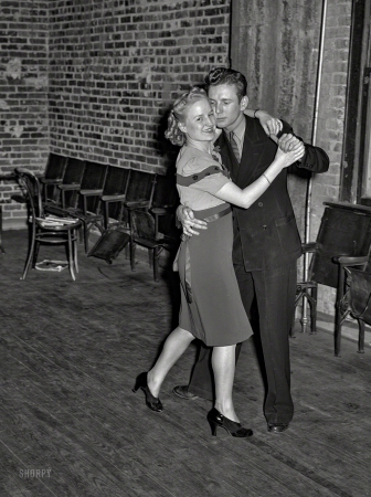 Photo showing: Cheek to Cheek -- February 1940. Young couple dancing at Jaycee buffet supper and party. Eufaula, Oklahoma.