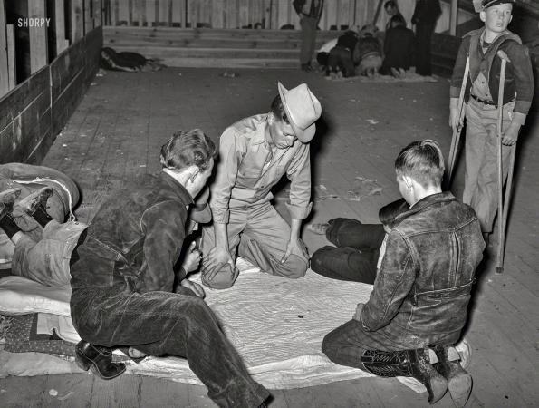 Photo showing: Low Rollers -- March 1940. San Angelo, Texas. Boys in a crap game at the San Angelo Fat Stock Show. 