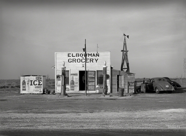 Photo showing: E.L. Bowman Grocery -- March 1940. Grocery store and filling station in the high plains. Dawson County, Texas.