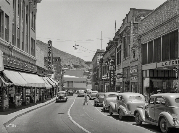 Photo showing: Busy Bisbee -- May 1940. Main street of Bisbee, Arizona. Copper mining center.