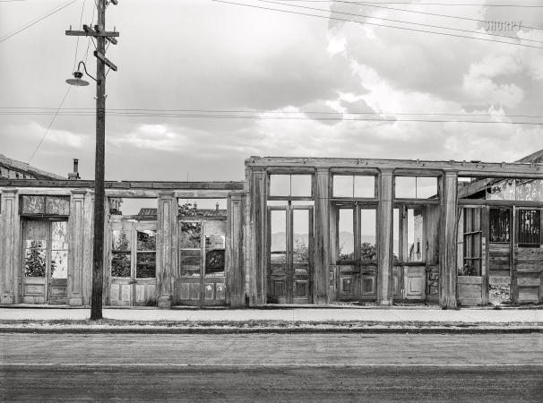 Photo showing: Tombstone: 1940 -- May 1940. Shells of old buildings on the main street of Tombstone, Arizona.