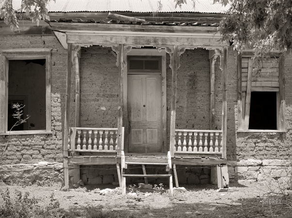 Photo showing: Dramatic Entrance -- May 1940. Front of abandoned residence in Georgetown, New Mexico. Ghost gold mining town.