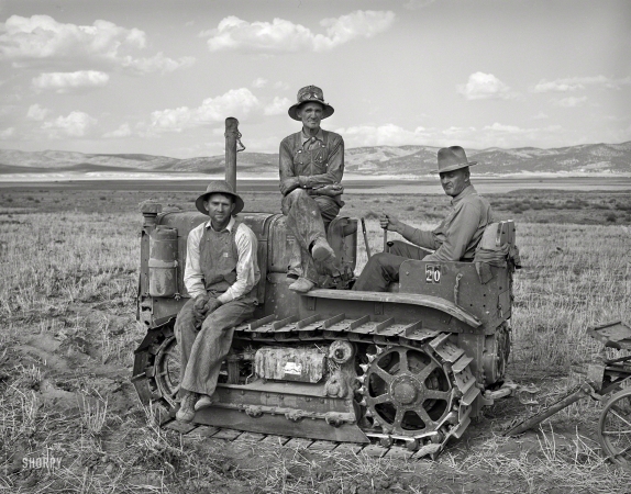 Photo showing: Box Elder County -- August 1940. Box Elder County, Utah. Farm Security Administration cooperative tractor.