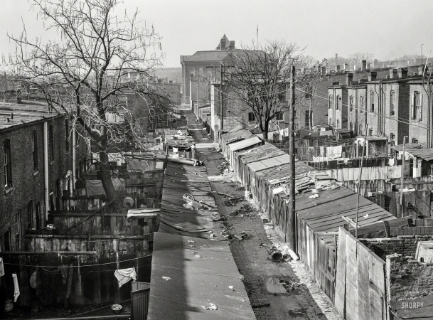 Photo showing: Alley Up -- November 1935. View of alley in Northwest Washington behind North Capitol Street. Blake School in background.