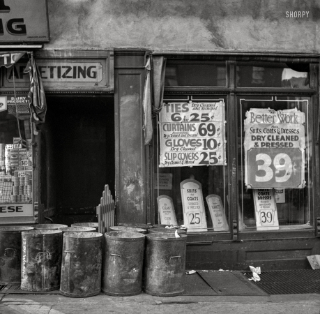 Photo showing: Blankets Fluffed -- December 1936. Across the street from Mrs. Hochfield's tenement. Washington Avenue, Bronx, New York.