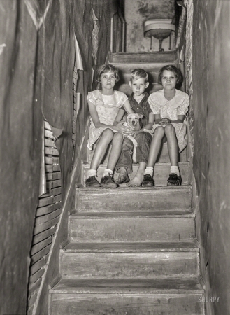 Photo showing: The Sink at the Top of the Stairs -- January 1937. Children of migrant citrus worker who lives in a rundown apartment house. Winter Haven, Florida.