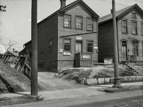 Photo showing: House of Signs -- April 1936. Blight -- 1316 West Walnut Street. Milwaukee, Wisconsin.