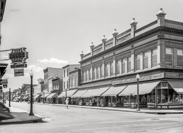 Photo showing: The Priscilla Block -- July 1938. The main street of Dover, Delaware.