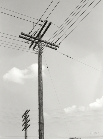 Photo showing: Poles Apart -- July 1937. Electrical and telephone wires. Rosslyn, Virginia.