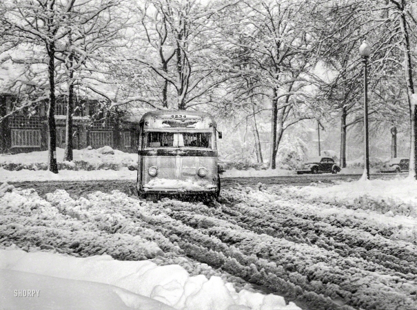 Photo showing: Slush Bus -- March 1942. Washington, D.C. Bus going through the snow near Connecticut Avenue and Chevy Chase Circle.