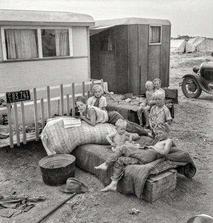 Photo showing: Okie Tater Tots -- May 1937. Children from Chickasaw, Oklahoma, in a potato pickers' camp near Shafter, California.