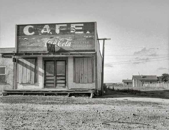 Photo showing: Sad! -- June 1937. Abandoned cafe in Carey, Texas, fast becoming a ghost town of the Texas plains.