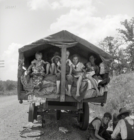 Photo showing: Arkansas Travelers. -- June 1938. Migrant Arkansas family on Highway 1 near Webbers Falls, Muskogee County, Oklahoma.