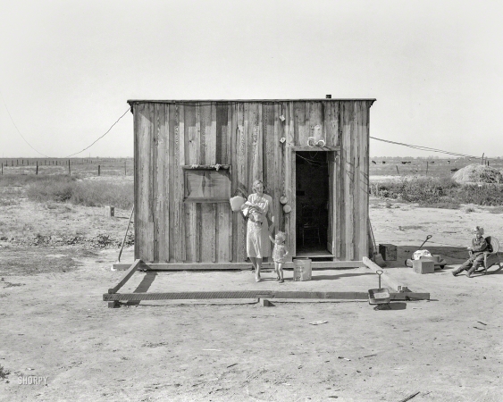 Photo showing: Little House: 1938 -- November 1938. Home of rural rehabilitation client, Tulare County, California.