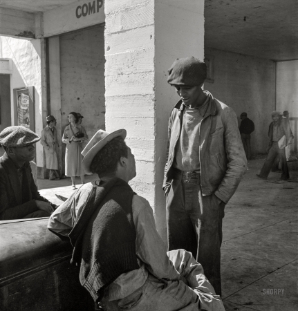 Photo showing: Migrant Brother -- February 1939. Calipatria, California. Outside the Farm Security Administration grant office during the pea harvest.