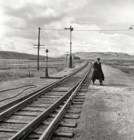 Photo showing: Brakeman in Black -- June 1939. West Carlin, Nevada. Brakeman on the Union Pacific Challenger.