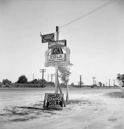 Photo showing: Carbonated Cabins -- May 1939. Between Tulare and Fresno on U.S. 99. Many auto camps of all kinds are strewn along this highway.