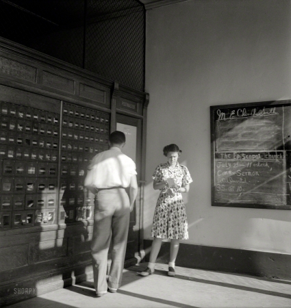 Photo showing: The Letter. -- July 1939. In the post office on a Saturday afternoon. Pittsboro, North Carolina.