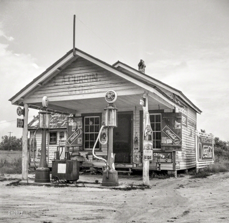 Photo showing: Currin Grocery -- July 1939. Granville County, N.C. Country filling station owned and operated by tobacco farmer.