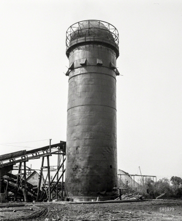 Photo showing: An Essential Part -- August 1939. Pelican Bay Lumber Co. The burner, an essential part of the sawmill. Near Klamath Falls, Oregon.