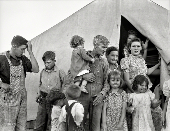 Photo showing: We Cant Go Home Again -- February 1939. Brawley, Imperial County, Calif.. Migrant labor camp during pea harvest. Family from Oklahoma with eleven children.